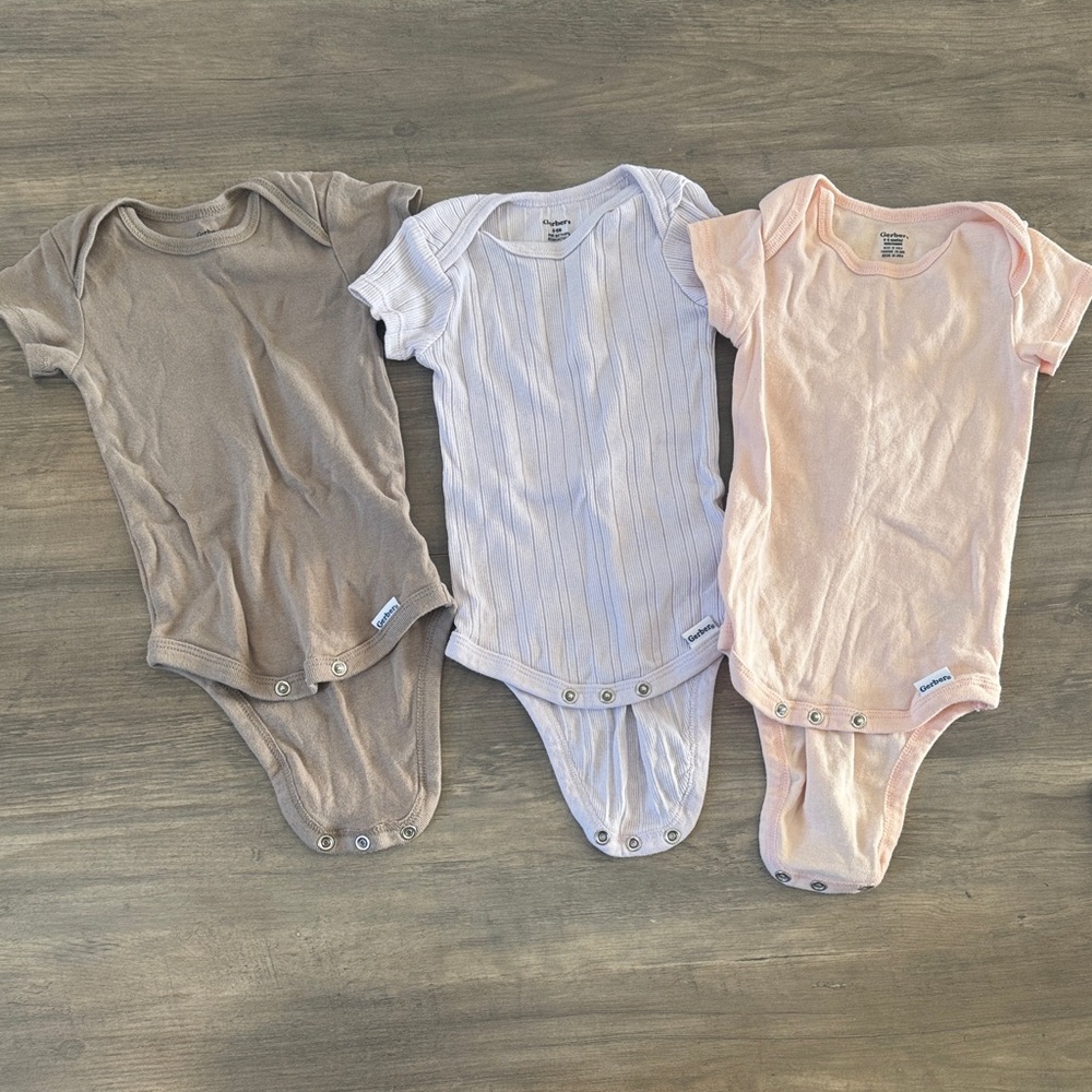 Gerber Baby Bodysuits in Brown, White, and Pink